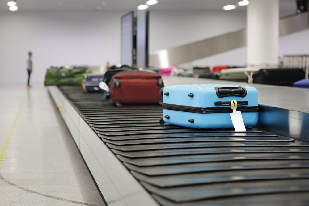 ดูแลกระเป๋าเดินทาง,Suitcase or luggage on conveyor belt,luggage